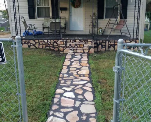 Stone walkway leading to a front porch